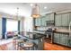 Charming kitchen boasts granite counters, stainless appliances and a large island with bar seating at 2250 W Village Junction Se Way, Smyrna, GA 30080