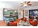 Open living space with kitchen view, eat-in island, and cozy seating area with colorful accents at 2250 W Village Junction Se Way, Smyrna, GA 30080