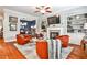 Comfortable living room open to dining area with stylish decor and ample natural light at 2250 W Village Junction Se Way, Smyrna, GA 30080