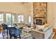 Bright living room with vaulted ceiling, fireplace and french doors to balcony at 2250 W Village Junction Se Way, Smyrna, GA 30080