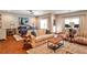 Open Main Bedroom features hardwood floors, natural light, sitting area, and king bed at 2250 W Village Junction Se Way, Smyrna, GA 30080