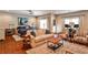 Open Main Bedroom features hardwood floors, natural light, sitting area, and king bed at 2250 W Village Junction Se Way, Smyrna, GA 30080