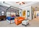 Spacious main bedroom featuring tray ceiling, floral wallpaper, sitting area, and natural light at 2250 W Village Junction Se Way, Smyrna, GA 30080
