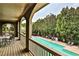 Balcony view overlooking the community pool and outdoor seating area at 2250 W Village Junction Se Way, Smyrna, GA 30080