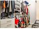Walk-in closet featuring shelving, drawers, hanging racks, and ample storage space at 2250 W Village Junction Se Way, Smyrna, GA 30080