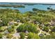 Community aerial view highlighting lake and lush greenery at 3015 Larkspur Ct, Cumming, GA 30041