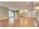 Finished basement with hardwood flooring, overhead lighting, and large recreational space at 3015 Larkspur Ct, Cumming, GA 30041