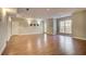 Large basement recreation room with hardwood flooring, recessed lighting, and natural light at 3015 Larkspur Ct, Cumming, GA 30041