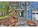 Backyard and side view showing the screened porch and wooden deck/stairs to porch at 3015 Larkspur Ct, Cumming, GA 30041