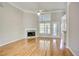 Bright living room with hardwood floors and fireplace at 3015 Larkspur Ct, Cumming, GA 30041
