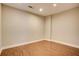Room with hardwood flooring, base molding, and recessed lighting at 3015 Larkspur Ct, Cumming, GA 30041