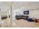 Finished basement with a sectional sofa, play area, tile floors, and natural light at 4765 Karls Gate Dr, Marietta, GA 30068
