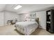 Bedroom featuring a queen-sized bed, nightstand, desk, and a bookshelf at 4765 Karls Gate Dr, Marietta, GA 30068