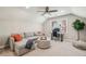 Spacious bonus room features carpet, a sectional sofa, and an office space at 4765 Karls Gate Dr, Marietta, GA 30068