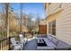 Spacious deck with outdoor seating, perfect for entertaining or relaxing with a view of the wooded backyard at 4765 Karls Gate Dr, Marietta, GA 30068