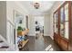 Elegant entry foyer featuring stairs, stylish light fixture and a view into the living room at 4765 Karls Gate Dr, Marietta, GA 30068