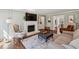 Spacious living room with a fireplace, hardwood floors, and elegant decor at 4765 Karls Gate Dr, Marietta, GA 30068