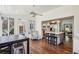 Sunroom with access to the kitchen and backyard, featuring wood-paneled ceiling at 4765 Karls Gate Dr, Marietta, GA 30068