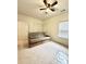 Spacious bedroom featuring a futon, bright natural light, and ample closet space at 5401 Fox Creek Lane, Norcross, GA 30071