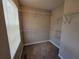 Walk-in closet with carpet and multiple metal shelves for optimal storage and organization at 5820 Wellborn Oaks Ct, Lithonia, GA 30058