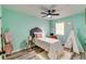 Cozy bedroom with a teepee, ladder and a stylish ceiling fan at 3620 Spring Trce, Decatur, GA 30034