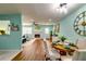 Cozy dining area showcases wood floors, a fireplace, and lots of room for entertaining at 3620 Spring Trce, Decatur, GA 30034