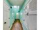 Bright hallway with hardwood floors, complemented by white doors and ample storage at 3620 Spring Trce, Decatur, GA 30034