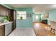Open concept kitchen area, seamlessly connecting to the dining and living areas at 3620 Spring Trce, Decatur, GA 30034