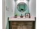 Stylish powder room featuring a modern vanity with quartz countertop and black faucet at 3620 Spring Trce, Decatur, GA 30034