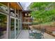 Spacious backyard with a patio, outdoor seating and landscaped yard at 151 Rockmart Dr Sw, Atlanta, GA 30314
