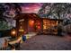 Stylish brick home featuring modern lighting, an artistic sculpture, and large windows at 151 Rockmart Dr Sw, Atlanta, GA 30314