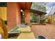 Striking brick home with a wood-plank walkway, modern lighting, and expansive windows at 151 Rockmart Dr Sw, Atlanta, GA 30314