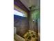 Modern shower with a large shower head and a unique tiled accent wall at 151 Rockmart Dr Sw, Atlanta, GA 30314