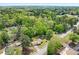 Aerial view of the property, highlighting the home's location and the expansive wooded surroundings at 645 Camp Perrin Rd, Lawrenceville, GA 30043