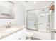 This bathroom features a shower and tub combination, vanity with storage, and updated tile at 725 Dalrymple Rd # 3G, Atlanta, GA 30328