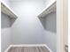 This walk-in closet is ready to be organized with a rod and shelf for extra storage space at 725 Dalrymple Rd # 3G, Atlanta, GA 30328
