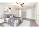 A bright and spacious main bedroom features a modern ceiling fan and beautiful decor at 725 Dalrymple Rd # 3G, Atlanta, GA 30328