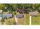 An aerial view highlighting the home's location on a tree-lined street with well-maintained yards at 3393 Ridgecrest Dr, Powder Springs, GA 30127