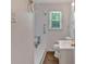 Bright bathroom featuring a walk-in shower and accessible features for convenience and safety at 3393 Ridgecrest Dr, Powder Springs, GA 30127