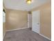 Empty bedroom with neutral walls, carpeted floor, window, and a closet at 3393 Ridgecrest Dr, Powder Springs, GA 30127