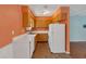 A view of the kitchen showcasing cabinets, countertops, sink, and white refrigerator at 3393 Ridgecrest Dr, Powder Springs, GA 30127