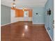 Inviting living room featuring hardwood floors and a view into the open-concept kitchen at 3393 Ridgecrest Dr, Powder Springs, GA 30127