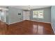 Bright living room featuring beautiful hardwood floors and a large window at 3393 Ridgecrest Dr, Powder Springs, GA 30127