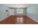 Living room showcasing hardwood floors and a wall-mounted TV setup at 3393 Ridgecrest Dr, Powder Springs, GA 30127