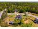 A beautiful aerial view of the house, showcasing its landscaping and partially fenced backyard at 7001 Palomino Trl, Winston, GA 30187