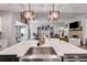 Open-concept kitchen view into living room, features a large island at 7001 Palomino Trl, Winston, GA 30187