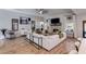 Bright, open living room features hardwood floors, stone fireplace, and modern décor at 7001 Palomino Trl, Winston, GA 30187