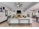Spacious living room with stone fireplace, ceiling fan, and stylish decor at 7001 Palomino Trl, Winston, GA 30187