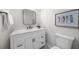 Stylish bathroom featuring modern vanity, square mirror, and elegant decor at 11815 Mountain Laurel Dr, Roswell, GA 30075