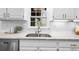 Bright kitchen with new countertops, stainless steel appliances, and white subway backsplash at 11815 Mountain Laurel Dr, Roswell, GA 30075